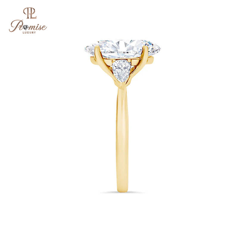 Classic Oval & Pear Three Stone Diamond Ring – Luxury Engagement Ring