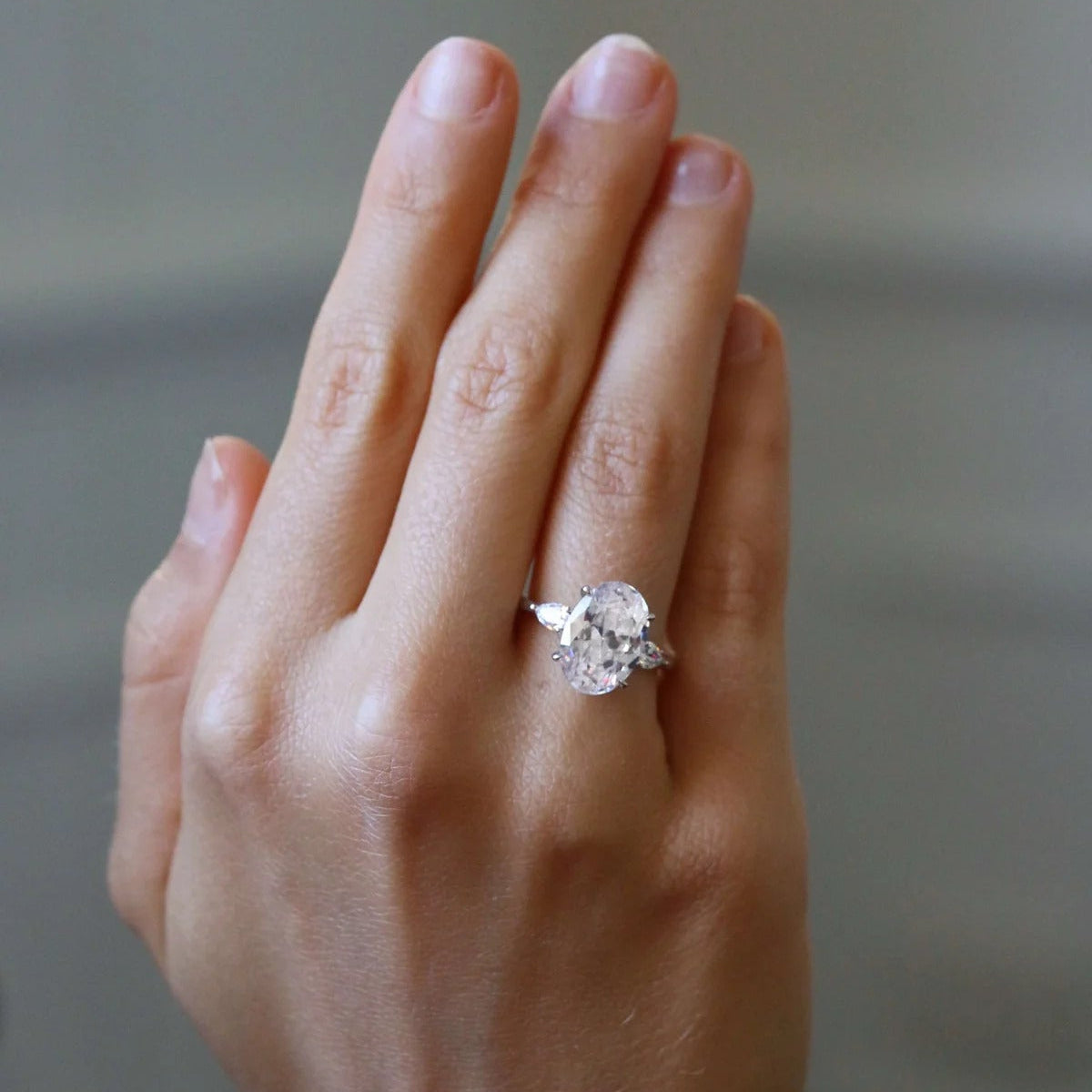 Classic Oval & Pear Three Stone Diamond Ring – Luxury Engagement Ring