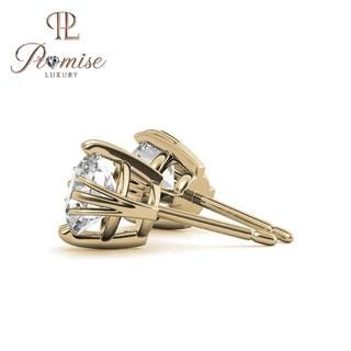 Classic 6-prong round diamond solitaire studs in 18K white gold—an elegant, everyday luxury with timeless brilliance